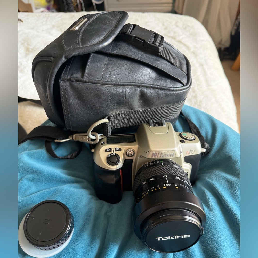 Nikon N60 35mm camera with Tokina 28-80mm lens plus carrying case & manual book